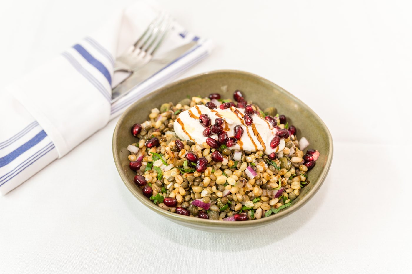 Greek grains salad with pomegranate